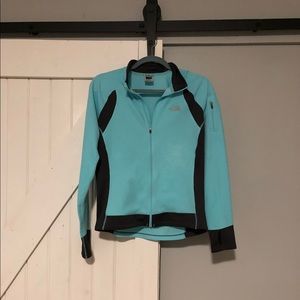 Light blue North Face zip up jacket